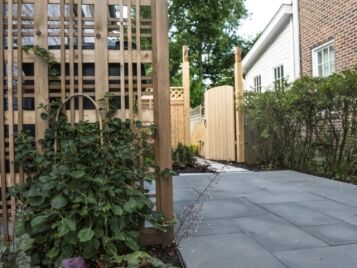 Asbury0384-1-scaled Paver walkway with a wood lattice trellis and climbing plantings — Apex Landscaping