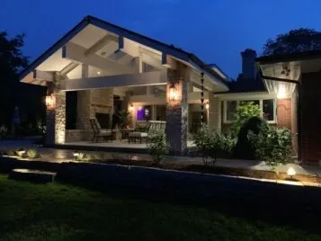 Patio-OutdoorLighting-LakeForest-IL-Apex-Landscaping Covered patio with outdoor lighting in Lake Forest, IL — Apex Landscaping