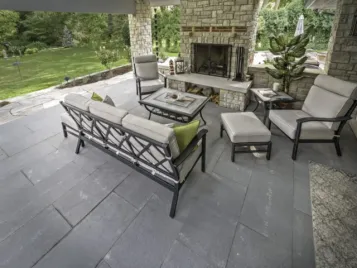 PetrovicImagery_Apex_Longvalley-10-scaled Covered stone patio with an outdoor fireplace and bluestone flooring — Apex Landscaping
