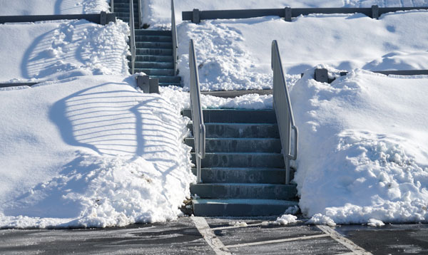 parking lot and stairs cleared of snow